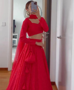 Queen in red lehenga