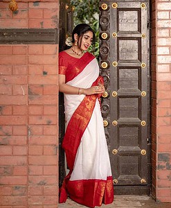 Lichi silk banarasi Saree with beautiful designs all over the saree border